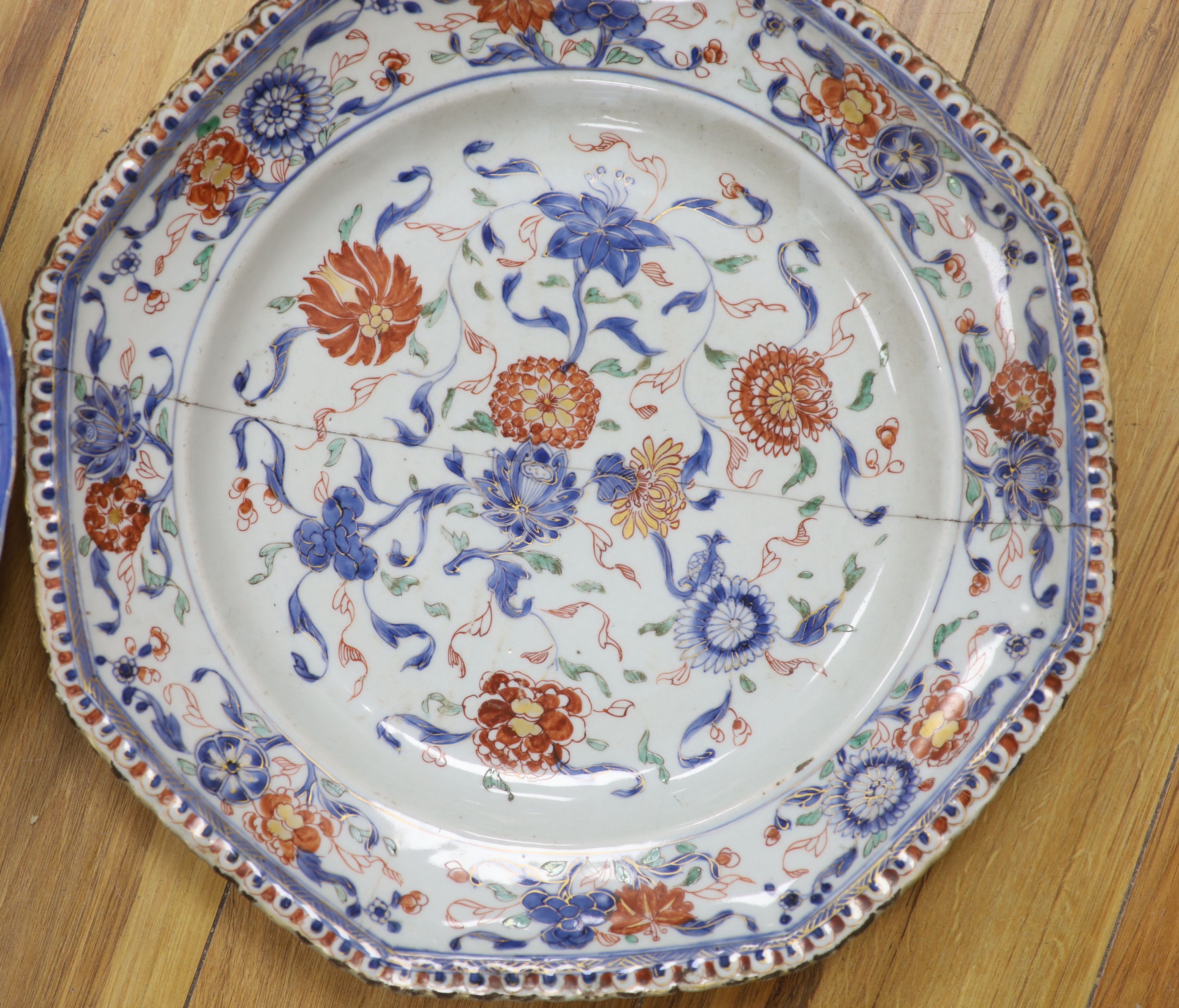 A Chinese Ming kraak blue and white dish, c.1640, together with a Kangxi Imari dish, c.1715, largest diameter 39cm